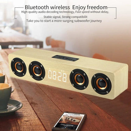 Wooden Clock Speaker With LED Clock For Home Use And Alarm on tabletop showing wood finish stereo drivers and LED time display
