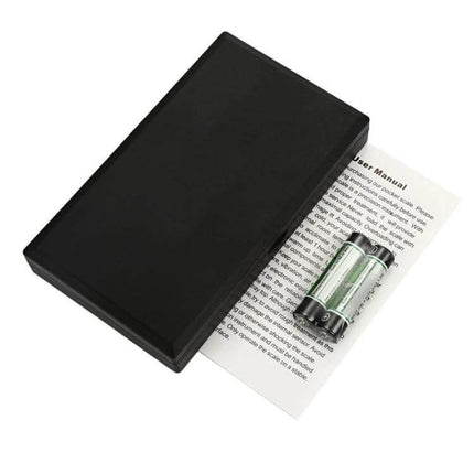 Compact Portable Jewelry Scale For Diamonds And Gold - MH-8015 compact black scale with batteries and user manual for precise on-the-go weighing