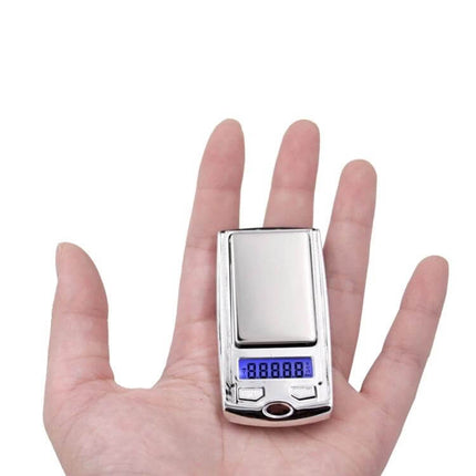 Car Key Shaped Pocket Jewelry Scale for Everyday Weighing compact silver key-shaped pocket jewelry scale on palm with digital display