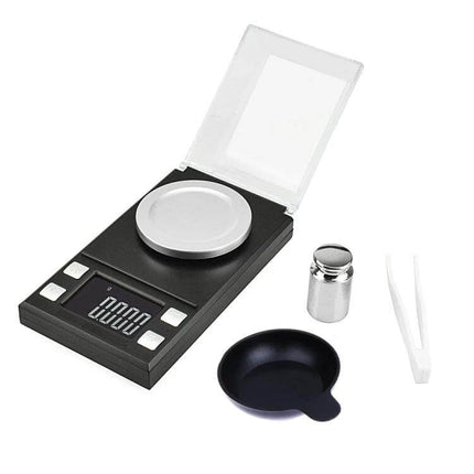 Portable Digital Jewelry Scale for Gemstone Weighing showing compact black scale with 1.6-inch display, weighing pan, calibration weight, scoop and tweezers