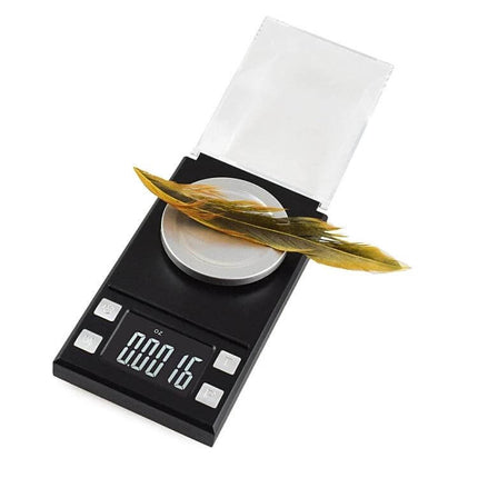 Portable Digital Jewelry Scale for Gemstone Weighing on counter with clear 1.6-inch display showing measurement