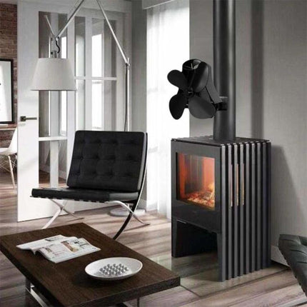 Quiet Aluminum Heat-Powered Fan for Fireplace Air Circulation mounted on wood stove to quietly distribute warm air throughout living room
