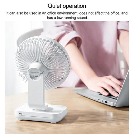 Compact Rechargeable Desktop Fan with Adjustable Speeds for Home and Office on desk providing quiet cordless cooling while working