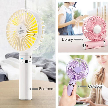 Compact Portable Foldable Handheld Electric Fan with Night Light shown in white, pink and purple for bedroom, library and outdoor use