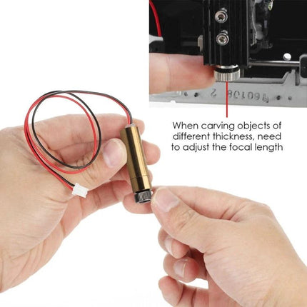 NEJE Blue Laser Module for DIY Engraving on Wood and Plastic showing 405nm laser module with adjustable focus and wiring held in hands