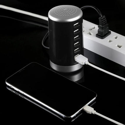 Versatile 6-Port USB Charging Station for Everyday Electronics charging multiple devices on a desk with phone connected