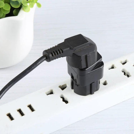 Universal UK to EU Travel Plug Adapter with Fuse for Charging Devices plugged into EU power strip, compact black adapter for UK devices