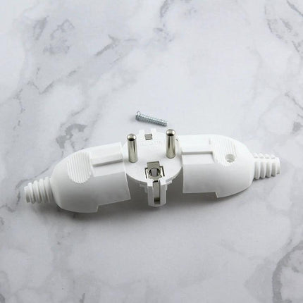 Detachable Side Wiring EU Power Plug for Electrical Devices white two-pin plug halves shown open with screw on marble background