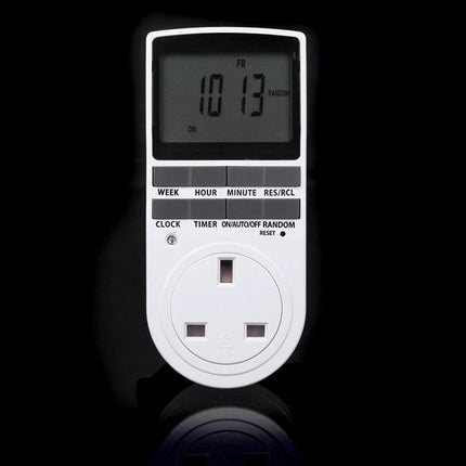 Smart Programmable Timer Plug with LCD Screen for UK Devices showing digital display and UK socket for scheduling and energy saving