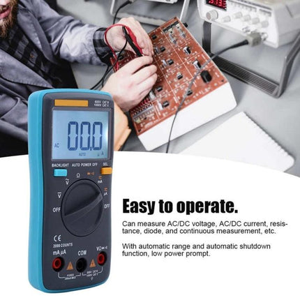 Portable Digital Multimeter for Everyday Electrical Testing - compact auto-ranging multimeter showing 0.0 on display being used to test a circuit board