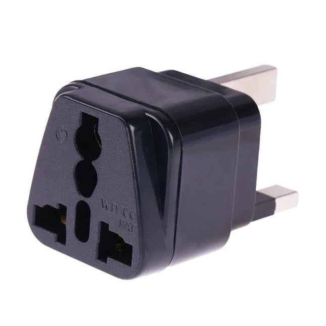 Portable Universal Socket Adapter with Fuse for UK, US, EU Plugs - compact black travel adapter with UK prongs and universal outlet, built-in fuse