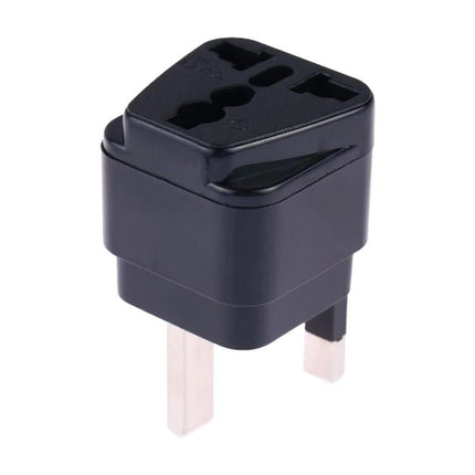 Portable Universal Socket Adapter with Fuse for UK, US, EU Plugs black travel plug adapter showing UK prongs and universal socket