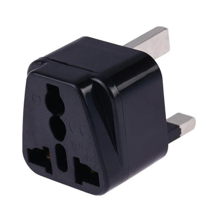 Universal Travel Adapter for UK Plug with Multiple Socket Compatibility - compact black UK-to-international socket travel charger
