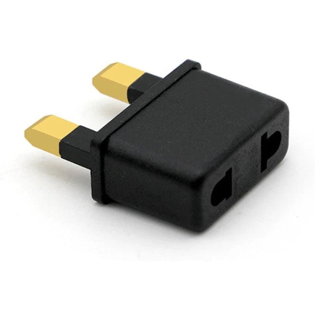 US and EU to UK Plug Adapter for Travel and Home Use - compact black travel adapter converting US/EU plugs to UK three-pin sockets
