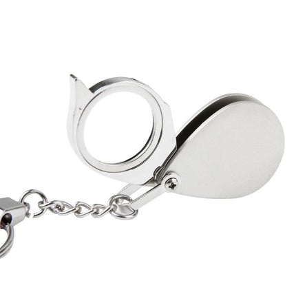 Portable Folding Magnifier for Jewelry and Antique Inspection - compact folding loupe with keychain for gem and coin detail viewing