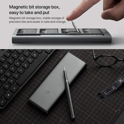 Xiaomi Mijia 24-in-1 Precision Magnetic Screwdriver Set for Repairs magnetic bit storage box and precision driver on desk with keyboard and glasses