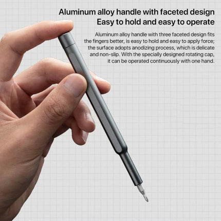 Xiaomi Mijia 24-in-1 Precision Magnetic Screwdriver Set for Repairs - close-up of aluminum alloy faceted handle held for precise electronics repair