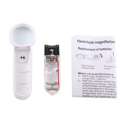 Alt Tag: Jakemy Portable 8X Optical Magnifier with LED Light for Precision Tasks showing opened battery compartment and instruction leaflet