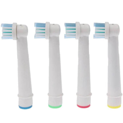 Electric Toothbrush Heads 4 Pack With Soft Nylon Bristles – four replacement brush heads with soft blue-tipped nylon bristles and colored base rings