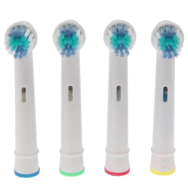 Electric Toothbrush Heads 4 Pack With Soft Nylon Bristles showing four replacement heads with soft multicolor bristles and colored base rings
