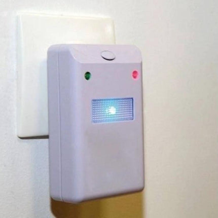 Electronic Pest Repellent EU Plug Ideal for Homes Everyday Use plugged into EU outlet on wall showing indicator lights and LED