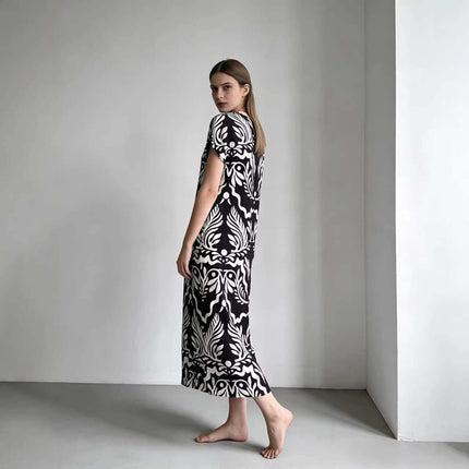 Elegant Loose Fitting Long Dress With Sailor Collar in black white knitted pattern, relaxed drape styled with flats or ankle boots