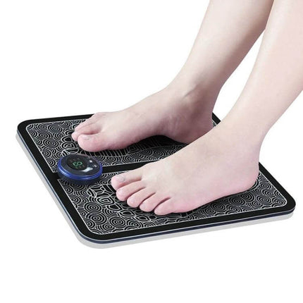 EMS Micro-Current Smart Foot Pad for Daily Foot Massage showing feet on compact pad with control for six-mode micro-current foot massage