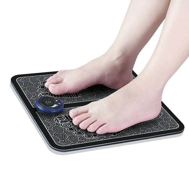 EMS Micro-Current Smart Foot Pad for Daily Foot Massage showing feet on compact pad with control for six-mode micro-current foot massage