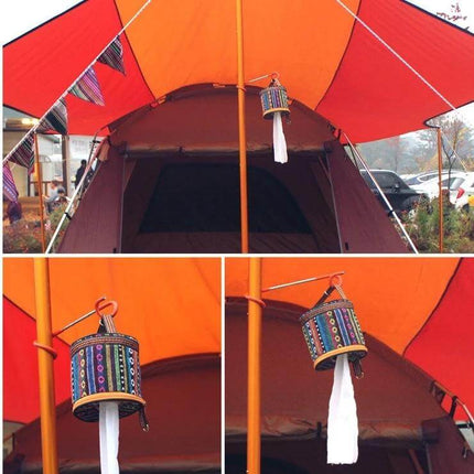 Ethnic Style Cloth Tissue Case 14.5 x 13 cm For Camping And Home Use hanging on orange tent pole showing ethnic patterned polyester tissue holder