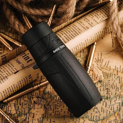 Eyeskey Portable Monocular Binoculars for Travel Everyday Use compact black monocular on vintage map for hiking concerts and sightseeing