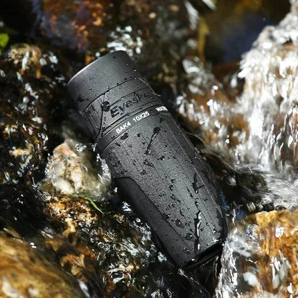 Eyeskey Portable Monocular Binoculars for Travel Everyday Use - compact waterproof 25mm monocular on wet rocks for hiking and outdoor viewing