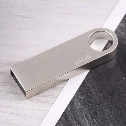 64GB Metal USB Flash Drive for Everyday Data Storage silver metal USB stick shown on tabletop, durable 64GB capacity