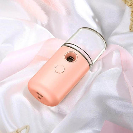 Facial Hydration Instrument USB Humidifier White For Daily Use in compact USB mist device on satin background, portable cold spray 30ml reservoir