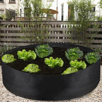 Felt Planting Barrel Indoor Round Plant Bag 50x20cm - black felt round grow bag with lettuce and cabbage in urban balcony garden