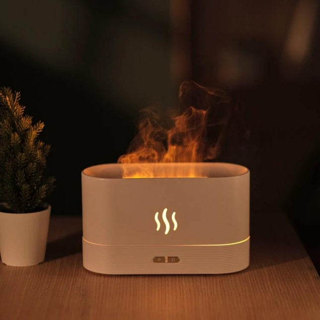 Flame Aroma Diffuser Night Light Humidifier White For Home Use on a nightstand with simulated flame light and mist