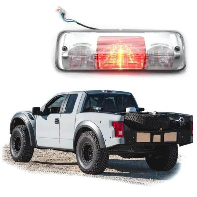 Ford F-150 High-Position Third Brake Light Replacement PC housing with LED elements shown above a white F-150 for direct-fit visibility