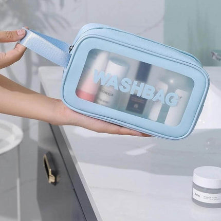 Frosted Translucent Waterproof Storage Bags 2 Pack For Travel shown as light blue frosted washbag with toiletries inside
