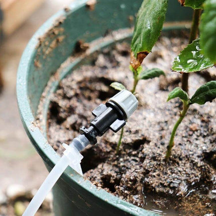 Gardening Drip Irrigation Accessories Orange Spray Head installed in potted plant for precise micro-spraying and even watering