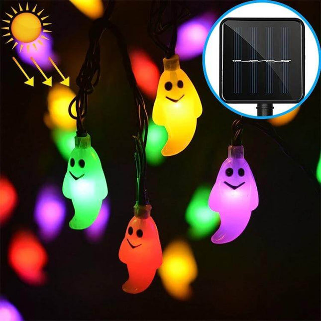 Ghost Shape Solar LED String Lights For Outdoor Garden Decor hanging multicolor ghost LEDs on a 6m string with solar panel for patio and fence lighting
