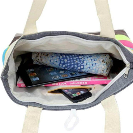 Green Canvas Stripe Shoulder Bag For Everyday Use All Day showing open interior with phone, tablet, wallet and organized pockets