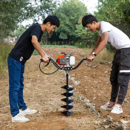 Ground Drill Bit Extension Rod For Planting Machines 60cm metal extension rod attached to two people operating an earth auger for row crop planting