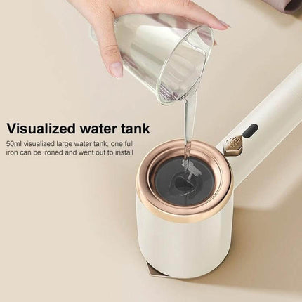 GT-01 Handheld Garment Steamer UK Plug For Quick Home Touch Ups - close-up of water being poured into the 50ml visualized tank