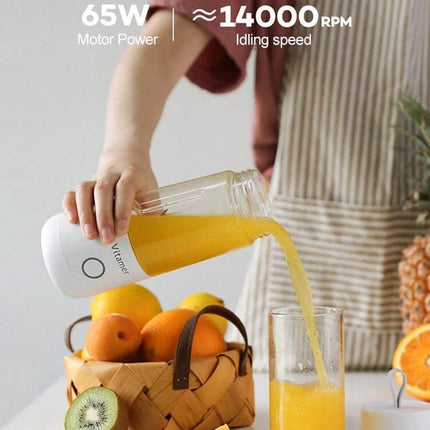 USB Mini Portable Juicer Cup 350ml For Smoothies On The Go - pouring orange juice from portable blender into glass