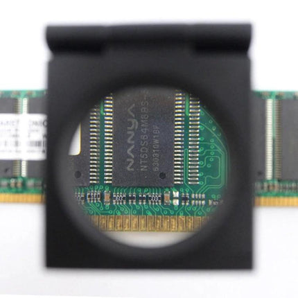 Mini Desk Magnifier with 10x Magnification for Detailed Viewing showing circuit board chip through optical lens