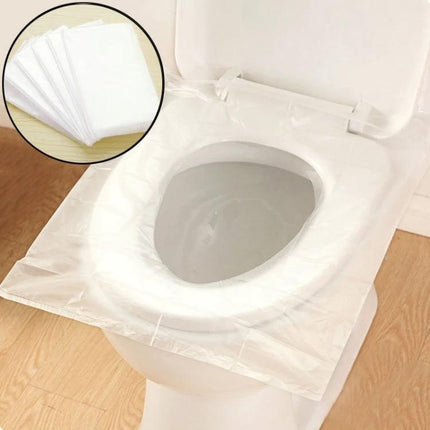 Disposable Toilet Seat Covers for Travel Hygiene Needs — white disposable seat cover placed on toilet for travel and public restroom protection