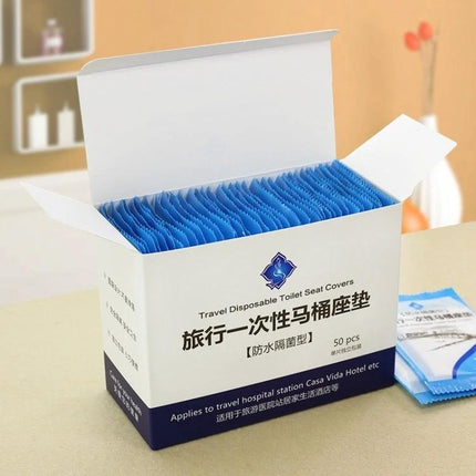 Disposable Toilet Seat Covers for Travel Hygiene Needs - box of 50 blue travel disposable toilet seat covers ready for use