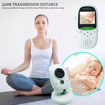 Wireless Baby Monitor with Two-Way Talk and Night Vision showing parent monitoring sleeping baby, camera, and handheld screen for remote viewing