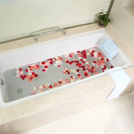 Plush Bathtub Headrest for Relaxing Evening Baths at Home - soft PVC foam headrest supporting neck while soaking in rose-petal filled tub