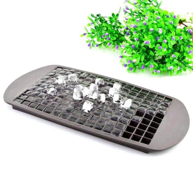 1cm Cube Durable Silicone Ice Tray for Everyday Use showing flexible black tray with multiple 1 cm cube ice pieces and decorative plant