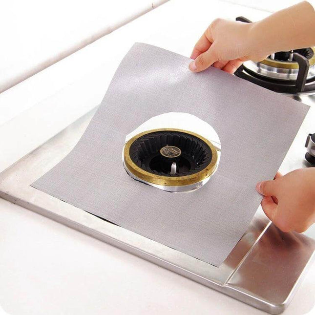 Stovetop Protective Cleaning Pad 27x27cm Ultra Thin reusable gray pad placed around gas burner to catch spills and protect glass stove surface